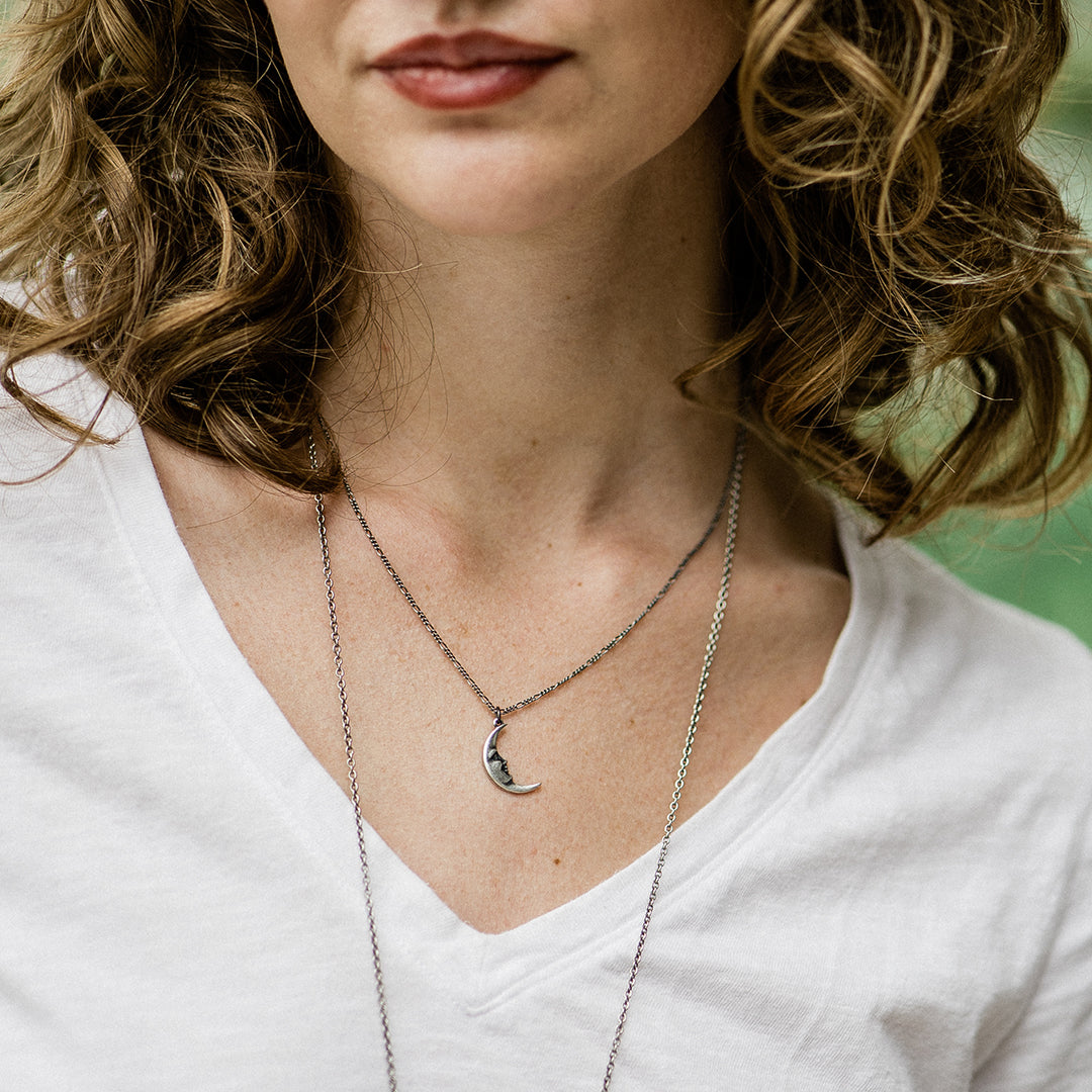 Man in the moon necklace store